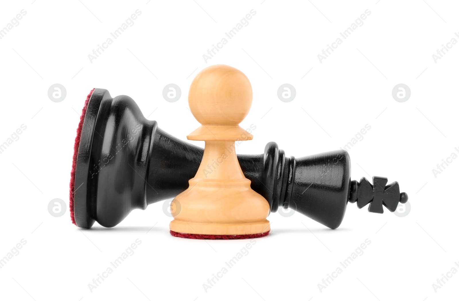 Photo of Pawn near fallen king chess on white background. Competition concept