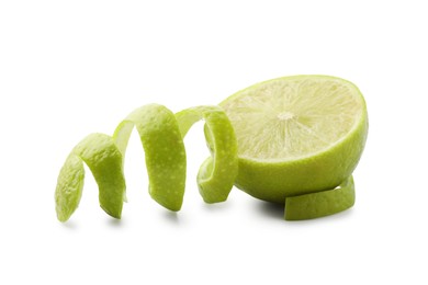 Photo of Fresh lime peel and half of fruit isolated on white