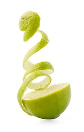 Photo of Fresh lime peel and half of fruit isolated on white