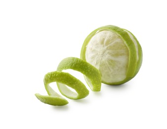 Photo of Fresh lime peel and fruit isolated on white