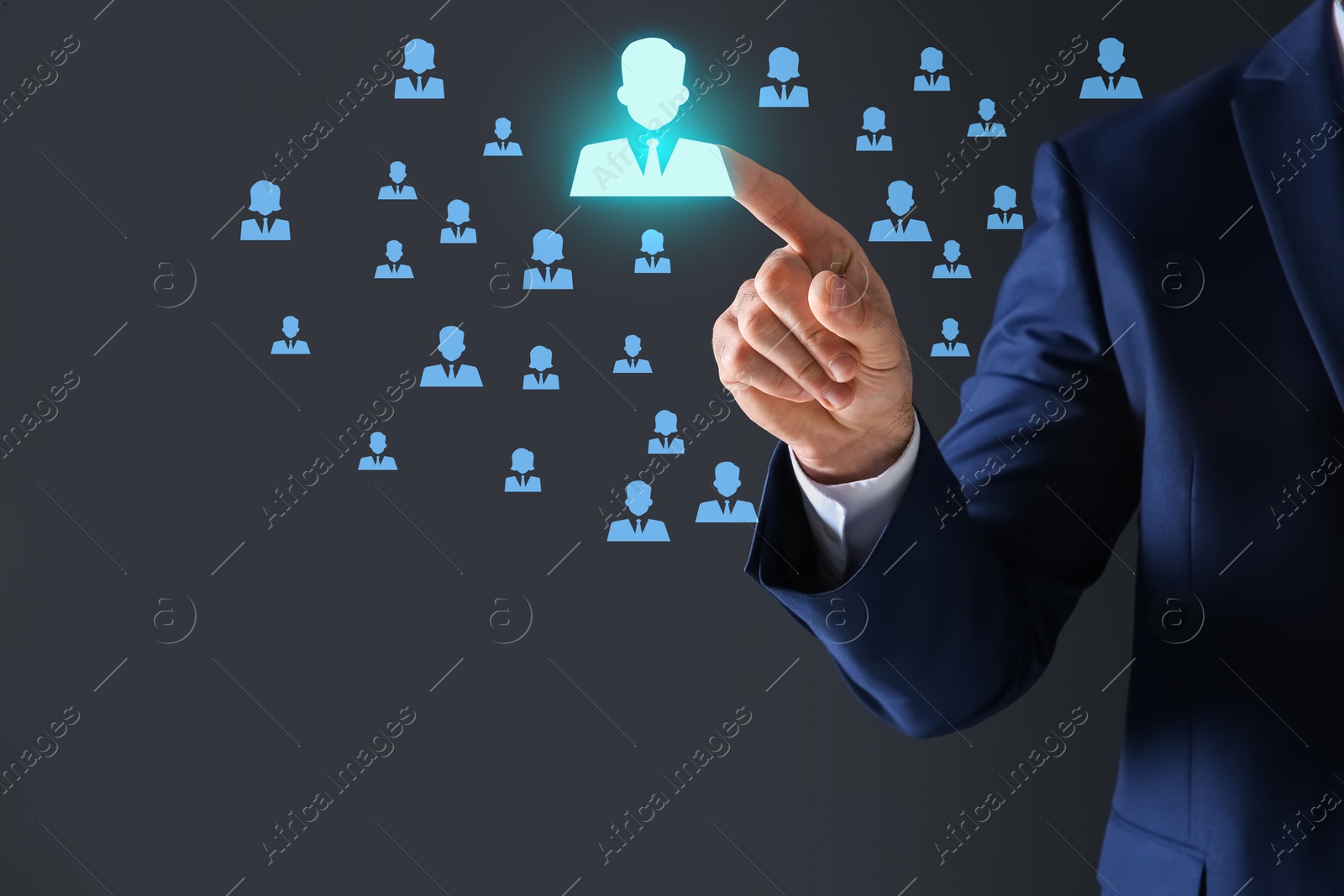 Image of Human resource. Businessman choosing one virtual figure among others on dark grey background, closeup