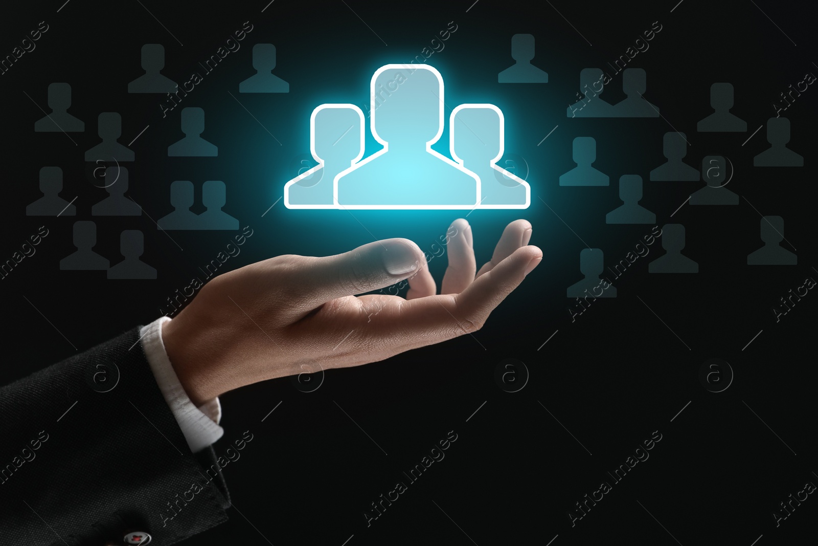 Image of Human resource. Businessman choosing virtual figure among others on black background, closeup