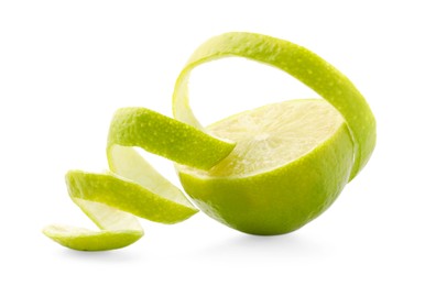 Photo of Fresh lime peel and half of fruit isolated on white