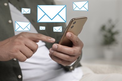 Image of Man using mobile phone indoors, closeup. New message notification near device. Illustration of envelope