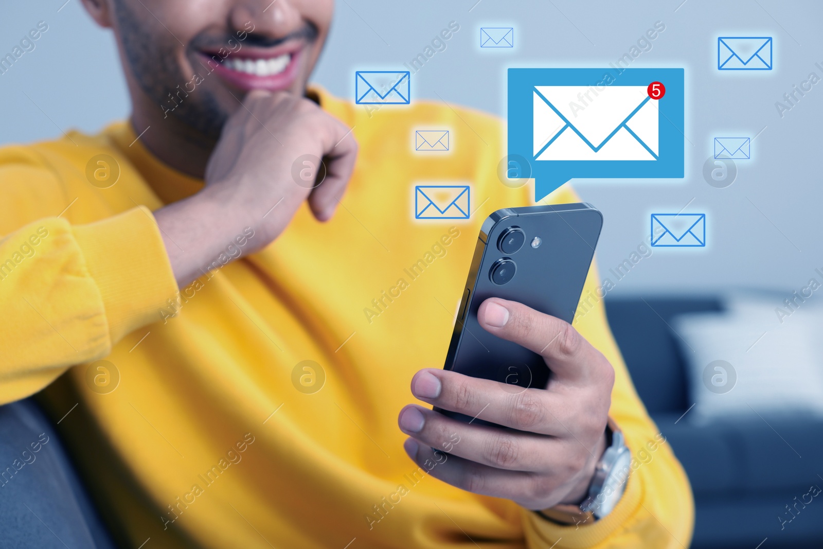 Image of Man using mobile phone indoors, closeup. New message notification near device. Illustration of envelope