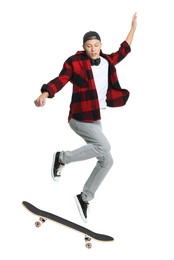 Image of Handsome man with skateboard in air on white background. Performing trick