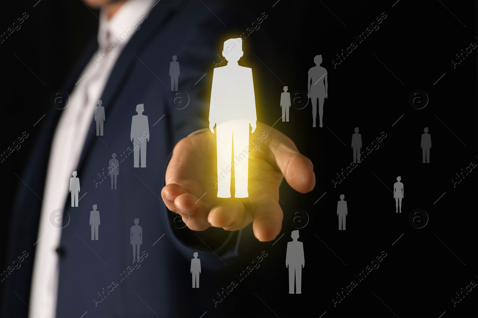 Image of Human resource. Businessman choosing one virtual figure among others on black background, closeup