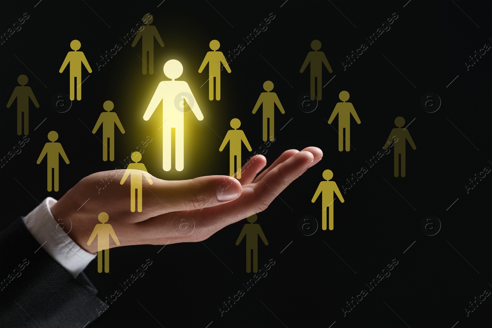 Image of Human resource. Businessman choosing one virtual figure among others on black background, closeup