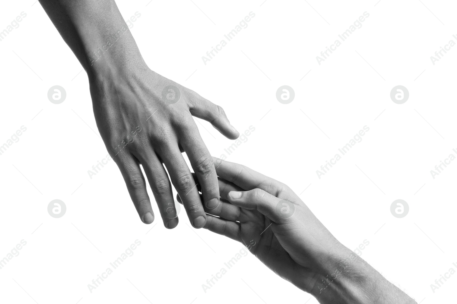 Image of Man giving helping hand to friend on white background, closeup. Toned in black and white