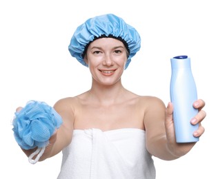 Photo of Woman with blue shower cap, mesh sponge and shampoo on white background