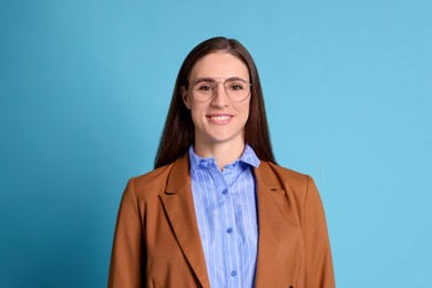 Photo of Portrait of banker on light blue background