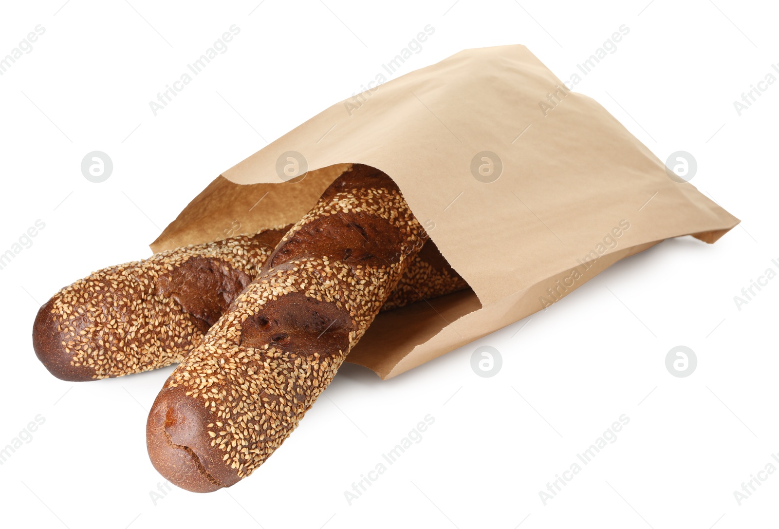 Photo of Fresh baguettes with sesame in paper bag isolated on white