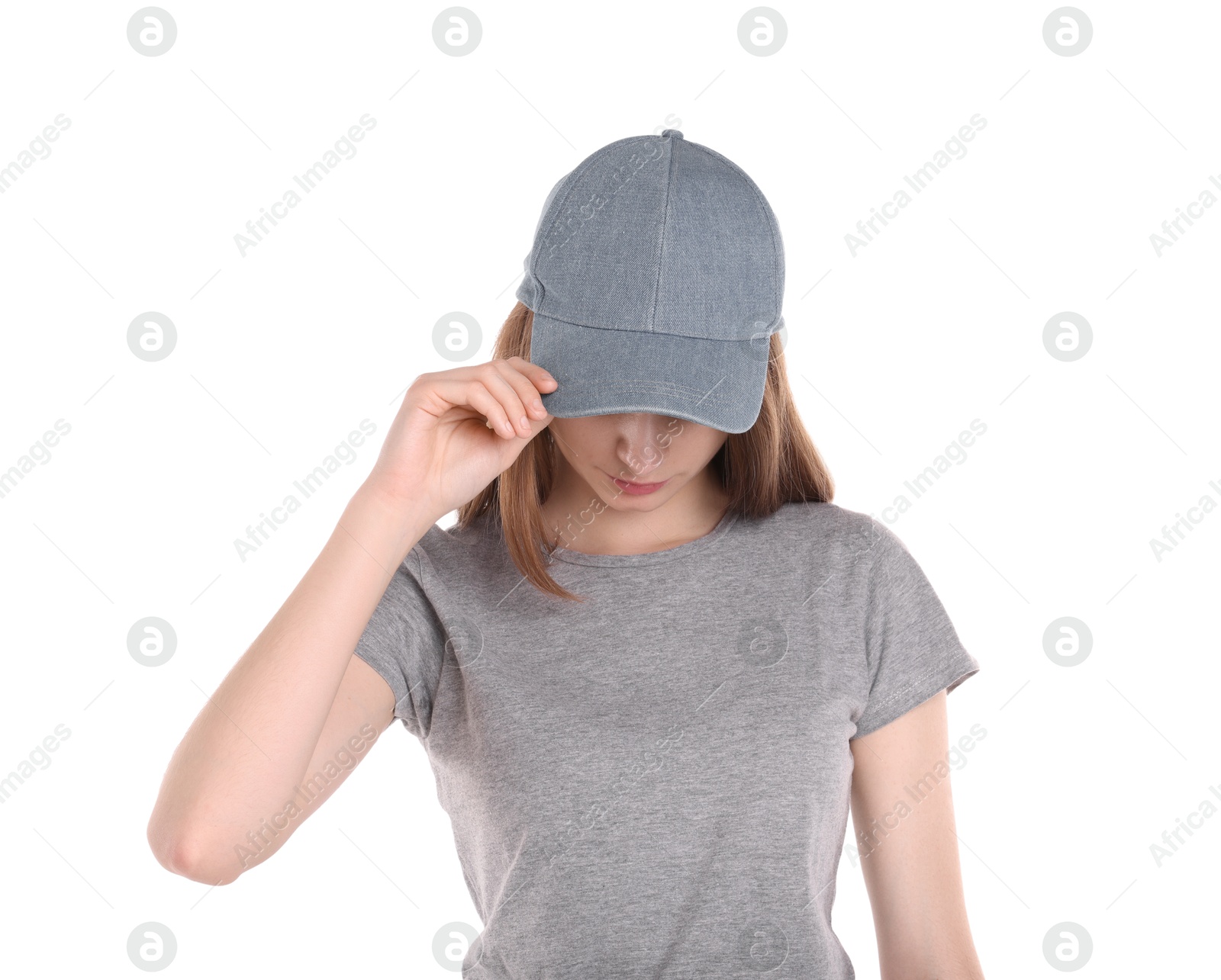 Photo of Woman in stylish baseball cap on white background. Mockup for design