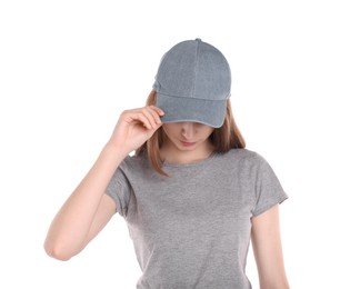 Photo of Woman in stylish baseball cap on white background. Mockup for design