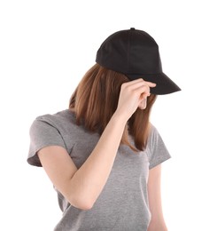 Photo of Woman in stylish baseball cap on white background. Mockup for design