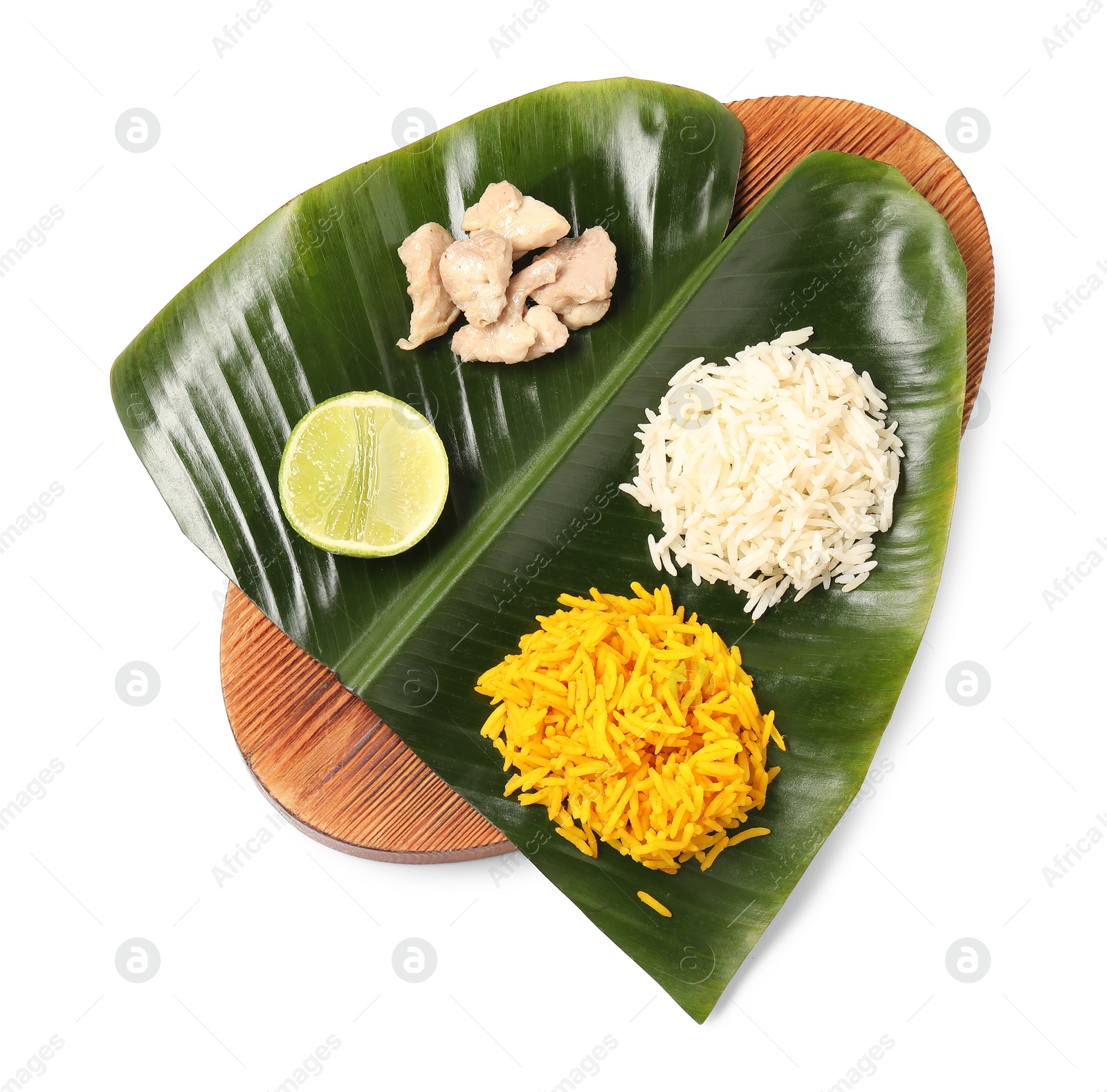 Photo of Cut banana leaf with different food isolated on white, top view. Healthy eco serving