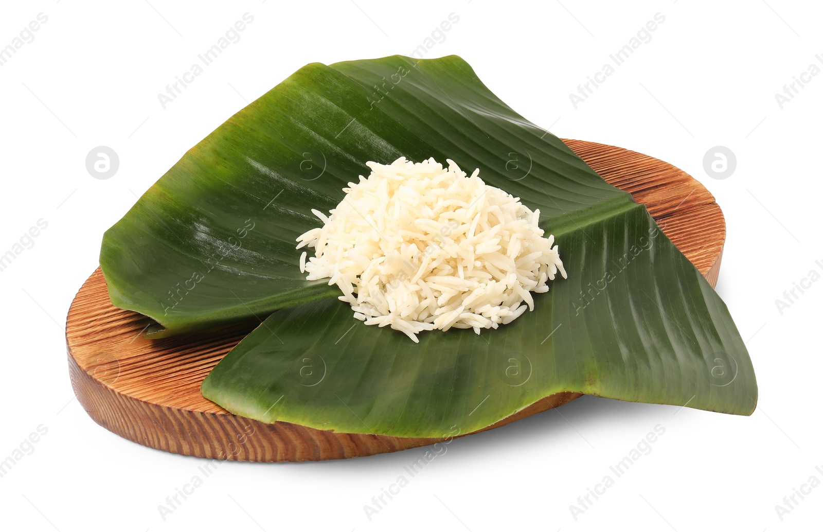 Photo of Cut banana leaf with pile of rice isolated on white. Healthy eco serving