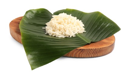 Photo of Cut banana leaf with pile of rice isolated on white. Healthy eco serving