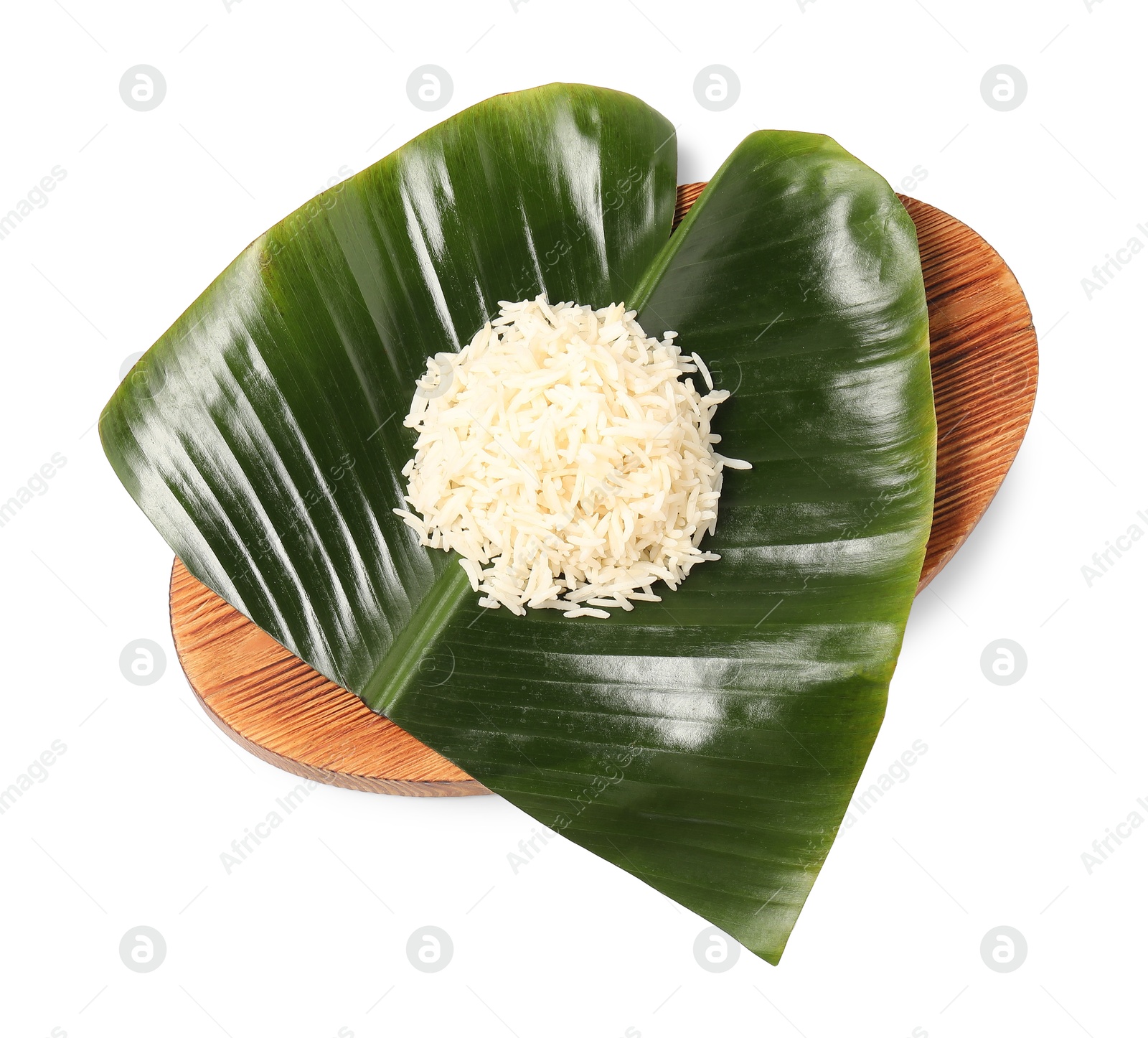 Photo of Cut banana leaf with pile of rice isolated on white, top view. Healthy eco serving