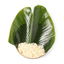 Photo of Cut banana leaf with rice in bowl isolated on white, top view. Healthy eco serving