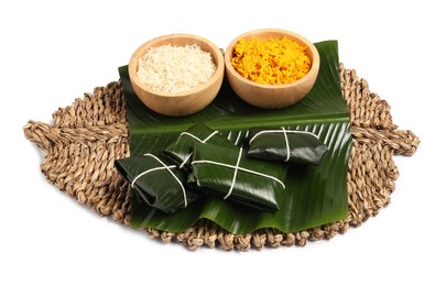 Photo of Cut banana leaves with rice isolated on white. Healthy eco serving