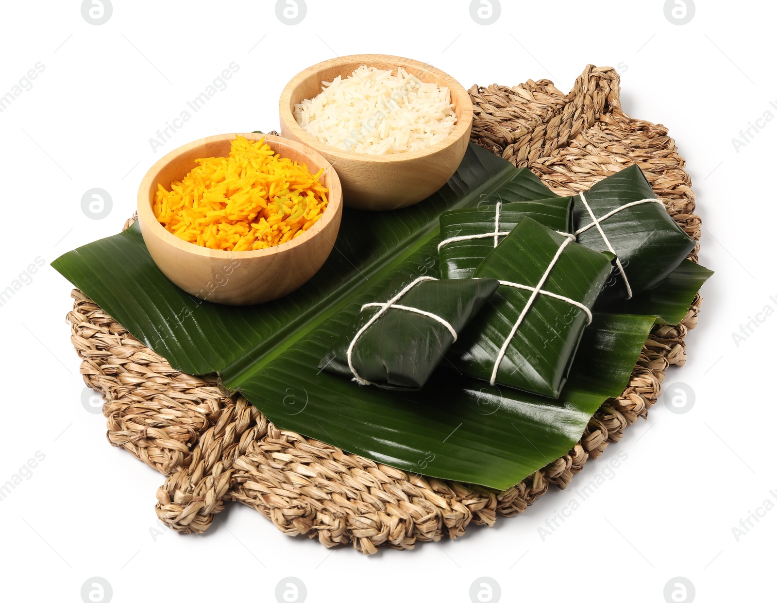 Photo of Cut banana leaves with rice isolated on white. Healthy eco serving