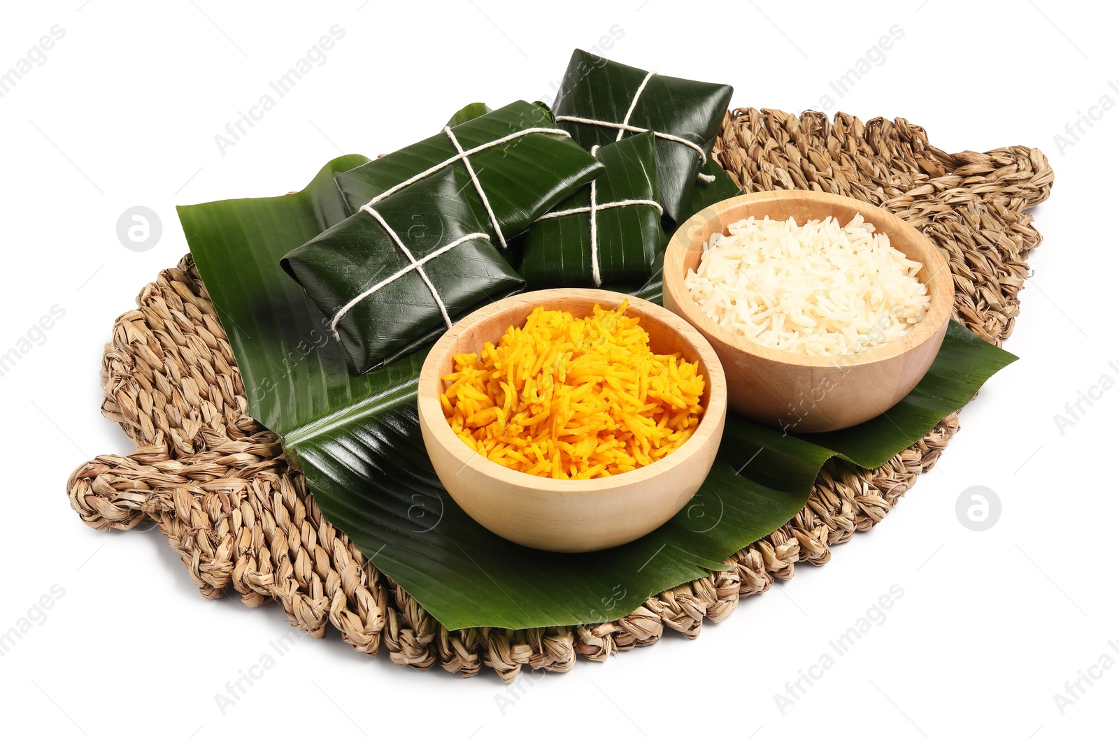 Photo of Cut banana leaves with rice isolated on white. Healthy eco serving