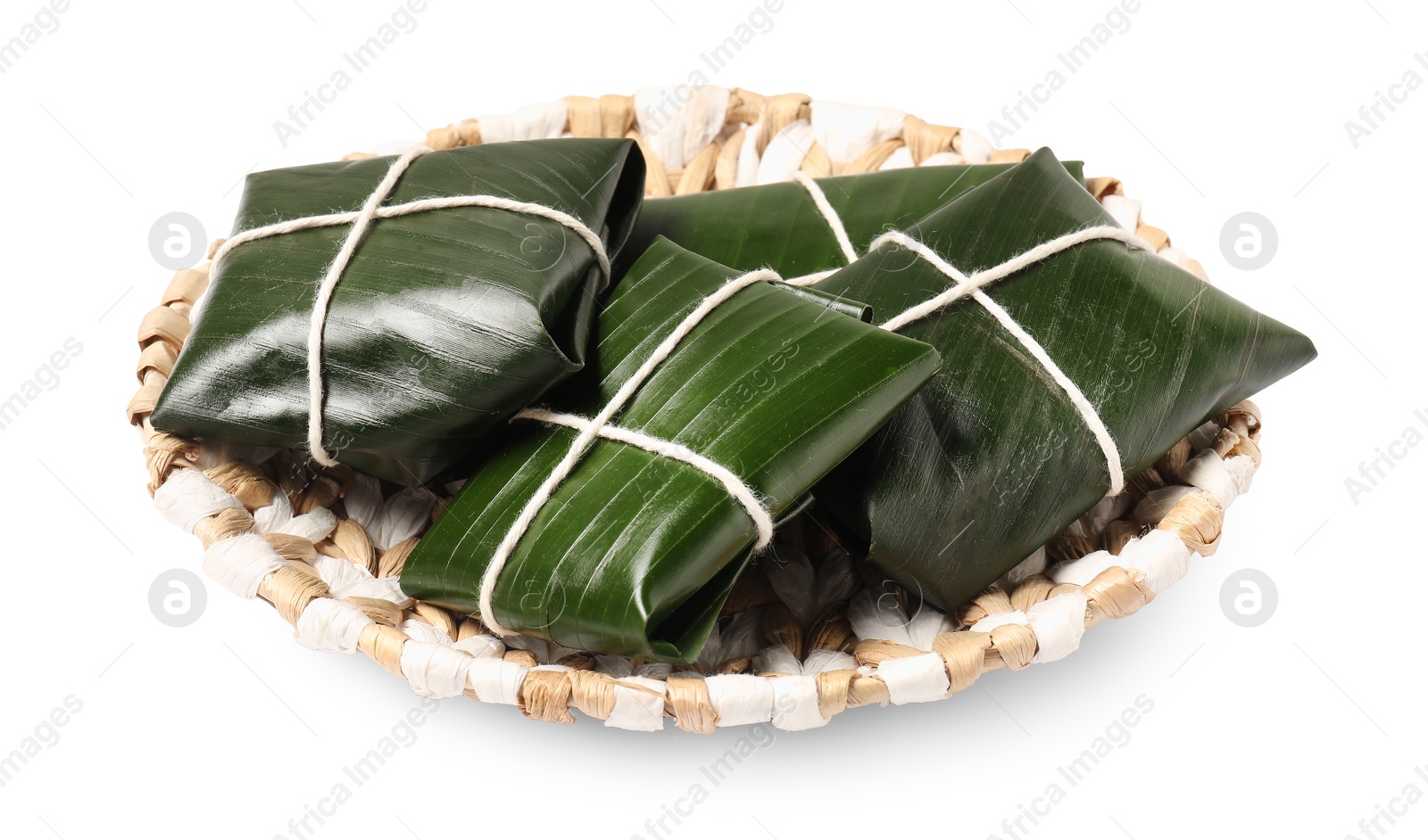 Photo of Cut banana leaves with food isolated on white. Healthy eco serving