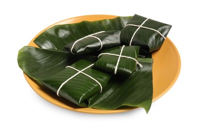 Photo of Cut banana leaves with food isolated on white. Healthy eco serving