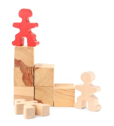 Photo of Human figures and wooden blocks as stages, red one on top against white background. Competition concept