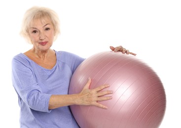 Photo of Senior woman with fitness ball on white background