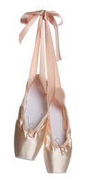 Photo of Pair of beautiful beige pointe shoes isolated on white