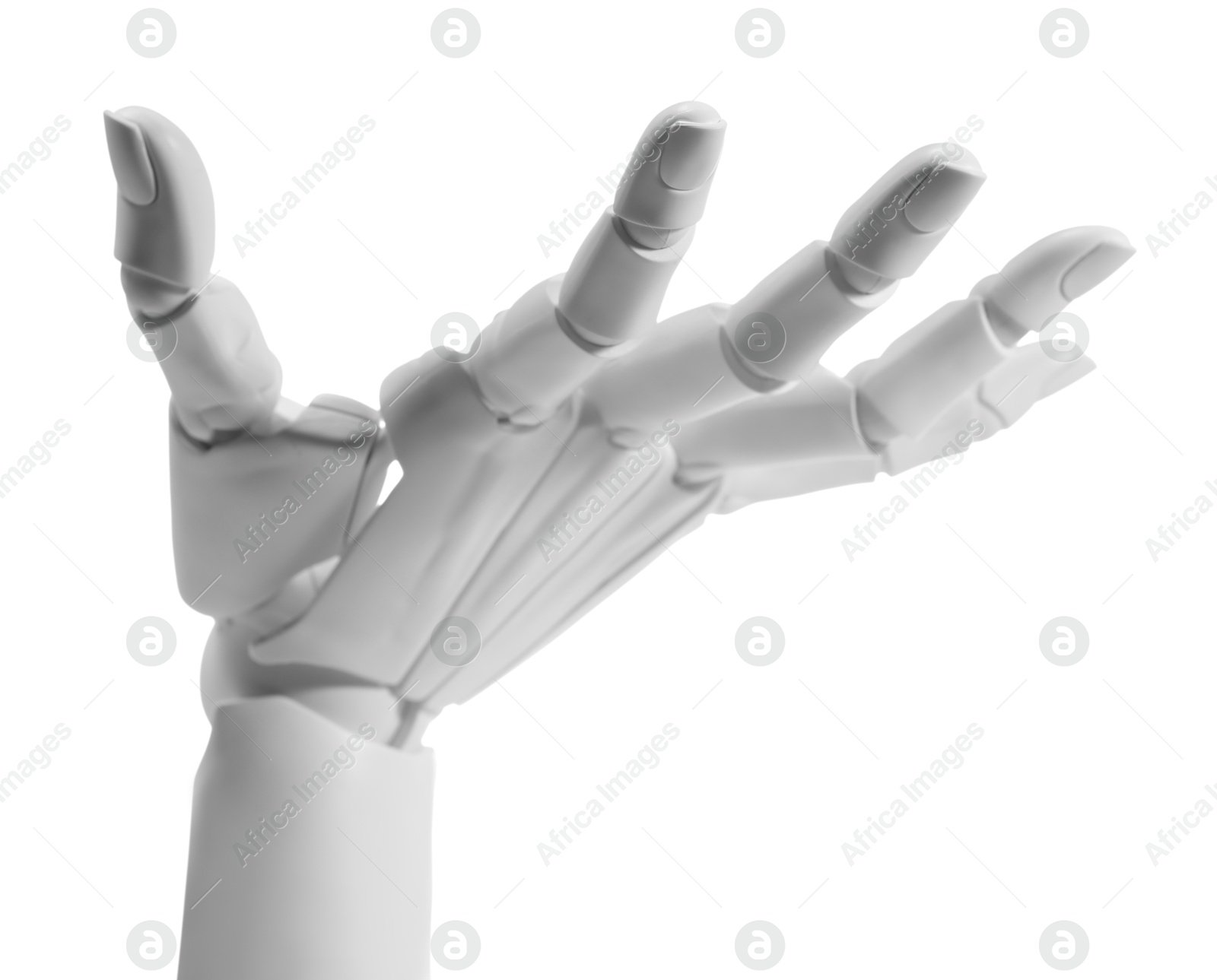 Photo of Artificial intelligence. Robot hand gesturing on white background