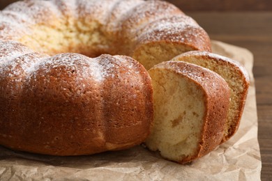 Photo of Freshly baked sponge cake on table, closeup