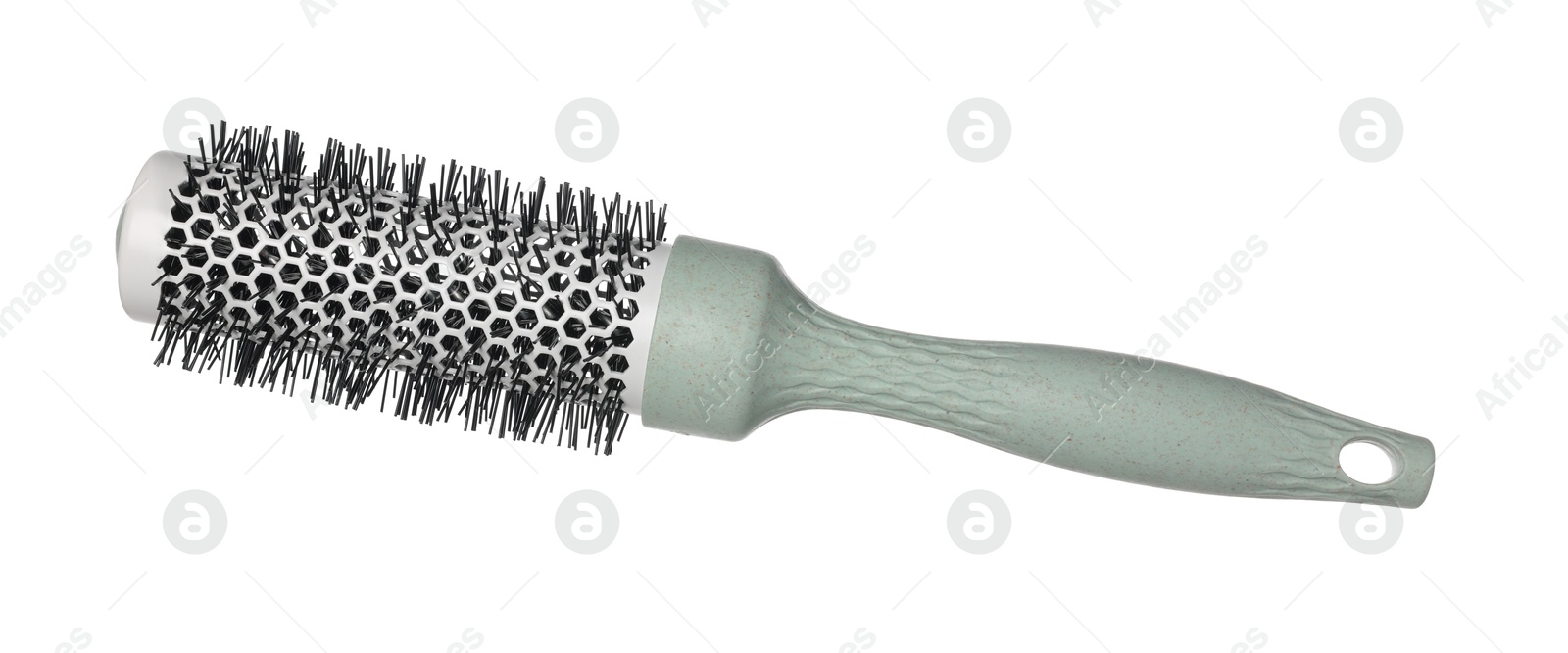 Photo of Hairdresser tool. Round brush isolated on white