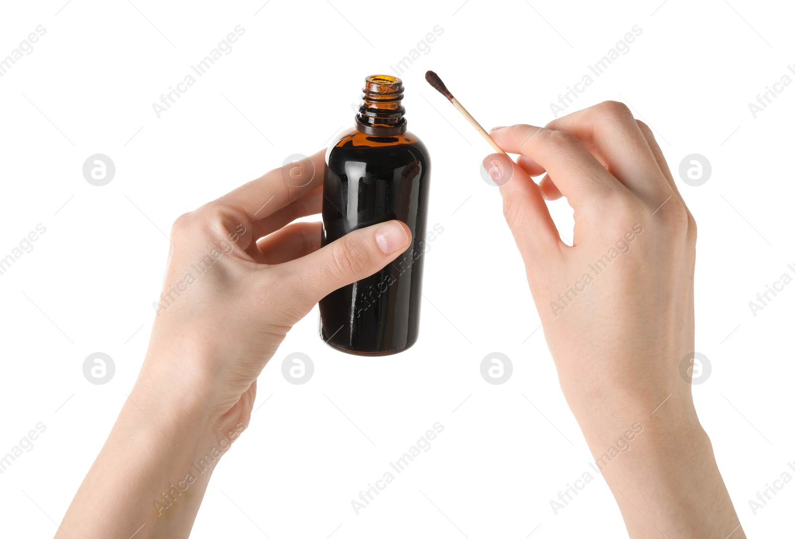 Photo of Woman with bottle of topical iodine and cotton swab on white background, closeup