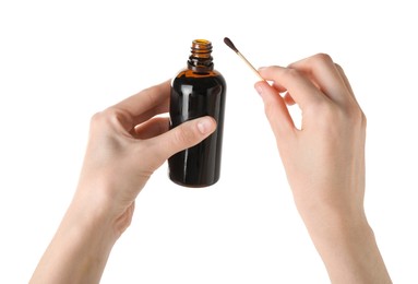 Photo of Woman with bottle of topical iodine and cotton swab on white background, closeup