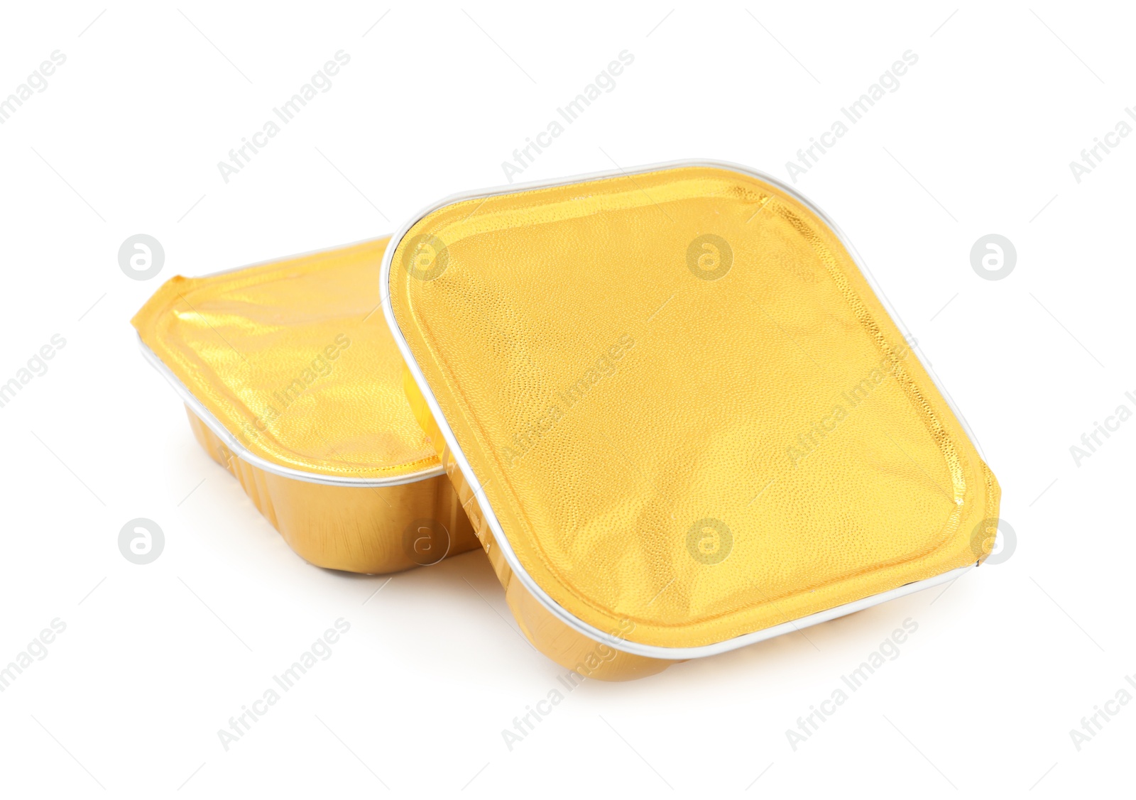 Photo of Pet food in foil containers isolated on white