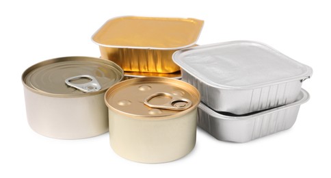 Photo of Pet food in foil containers and tin cans isolated on white