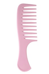 Photo of One pink plastic comb isolated on white