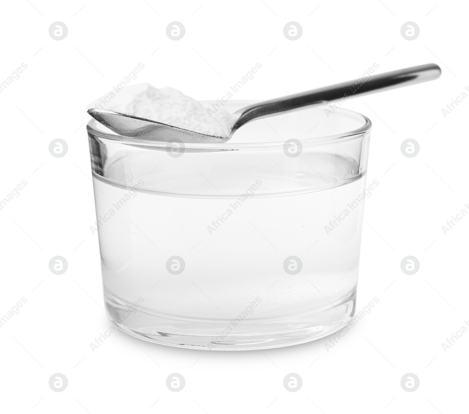 Photo of Glass of water and baking soda on white background