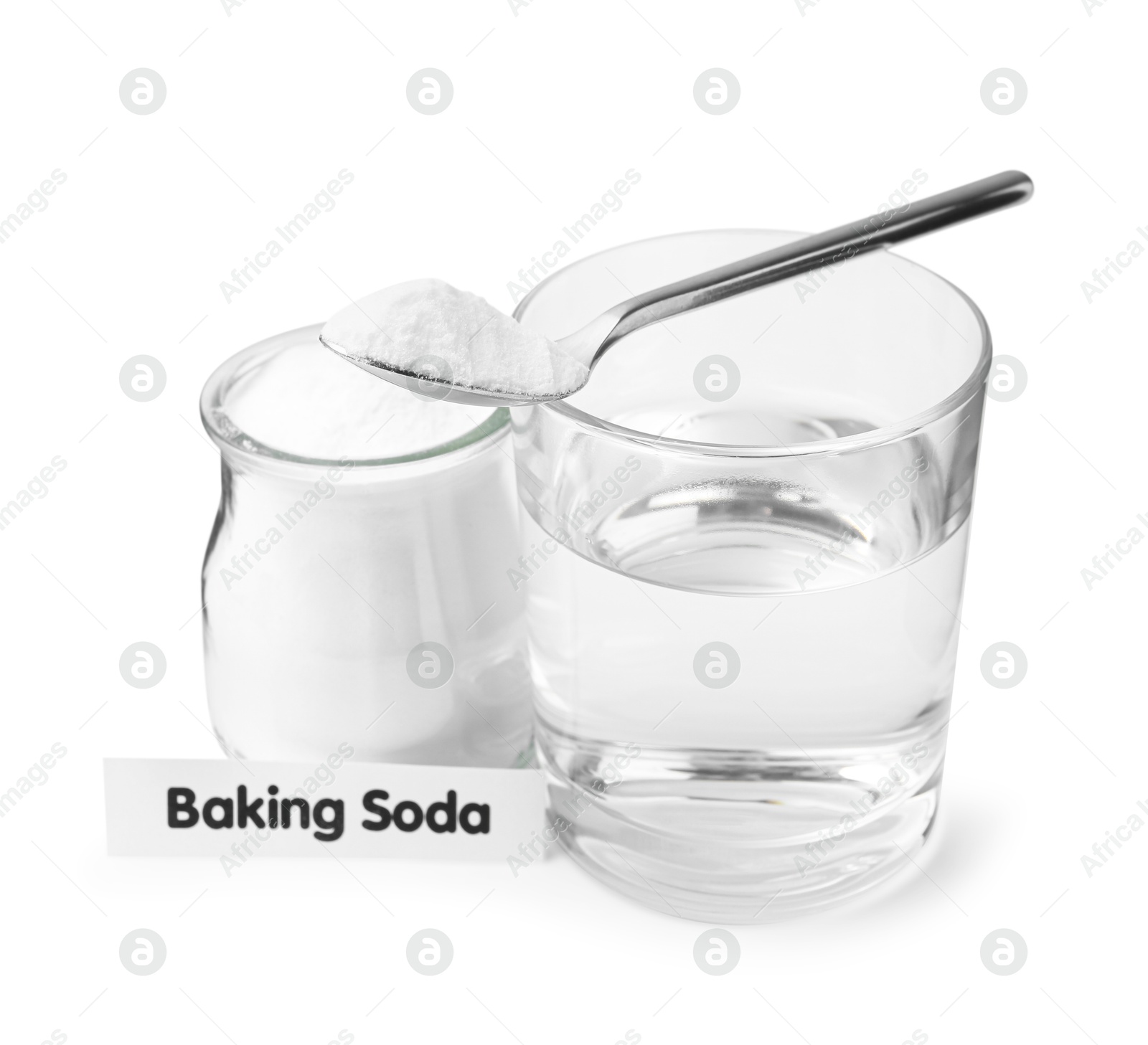 Photo of Glass of water and baking soda on white background