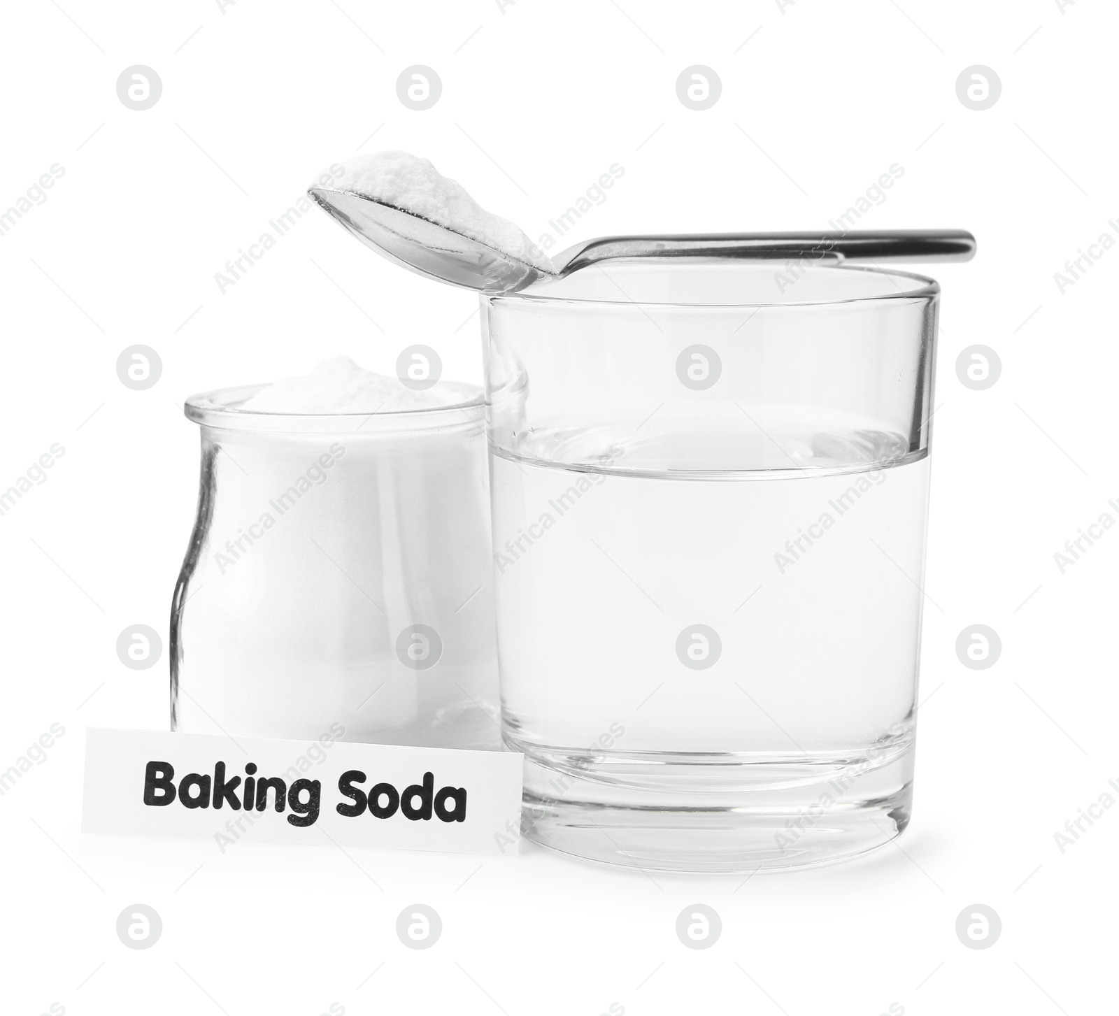 Photo of Glass of water and baking soda on white background