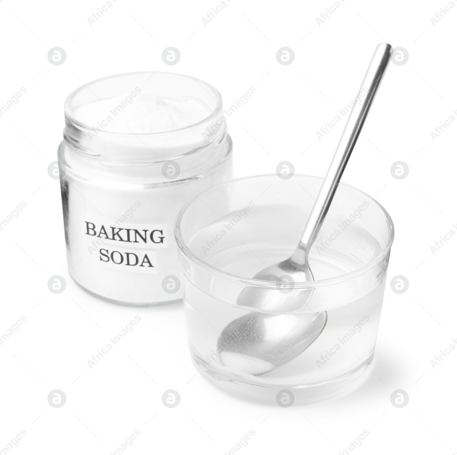 Photo of Glass of water and baking soda on white background