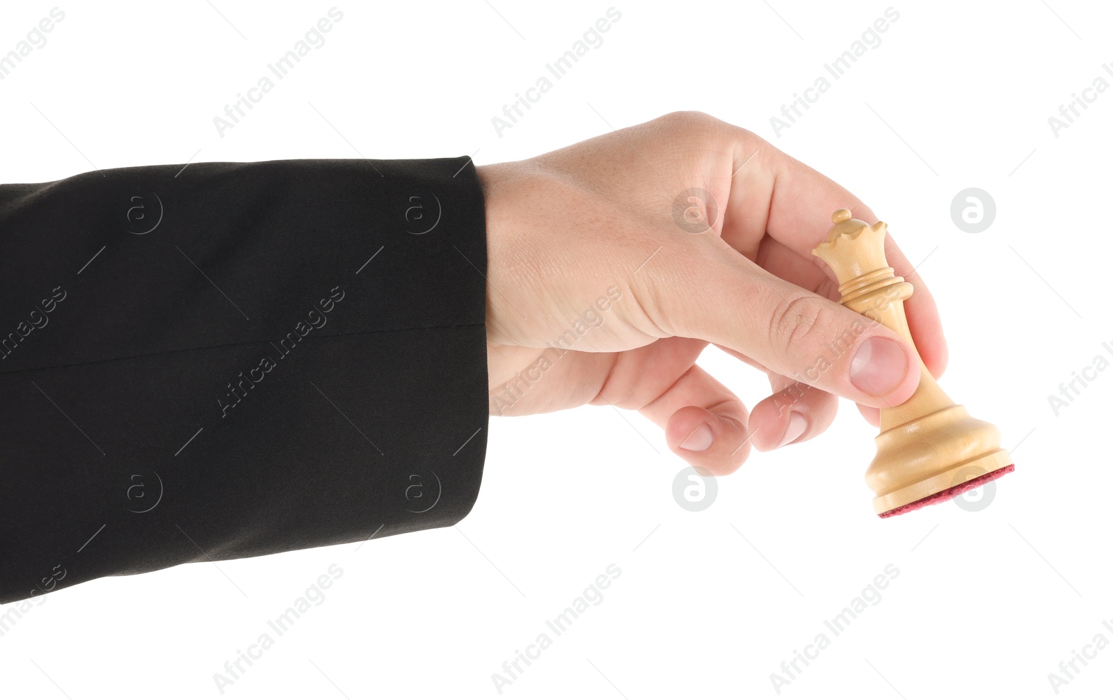 Photo of Man holding chess queen on white background, closeup. Competition concept