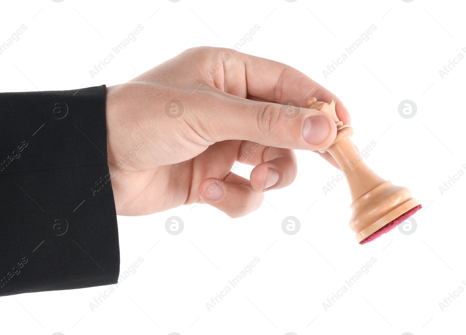 Photo of Man holding chess queen on white background, closeup. Competition concept