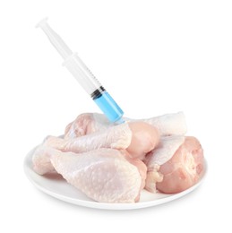 Photo of GMO concept. Chicken drumsticks and syringe isolated on white