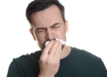 Photo of Sad man with paper tissue crying on white background