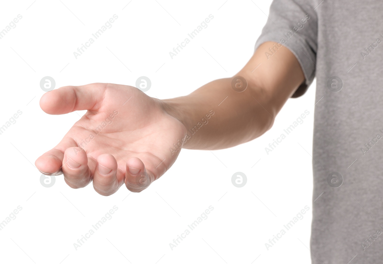 Photo of Offering help. Man reaching his hand on white background, closeup