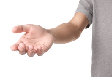 Offering help. Man reaching his hand on white background, closeup